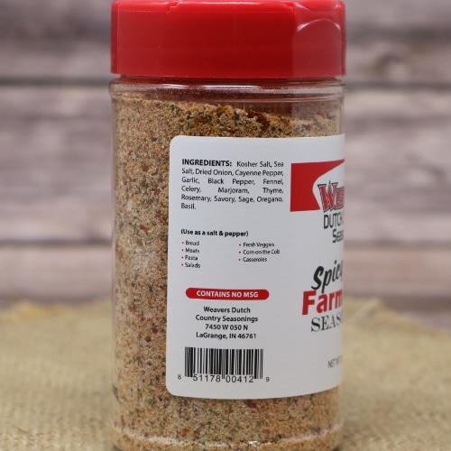 Back label of Weaver's Dutch Country Seasonings Spicy Farm Dust with a list of ingredients and suggested uses, set against a burlap background.