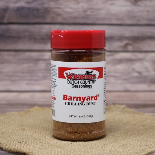 A jar of Weaver's Dutch Country Seasonings Barnyard Grilling Dust with a red lid.