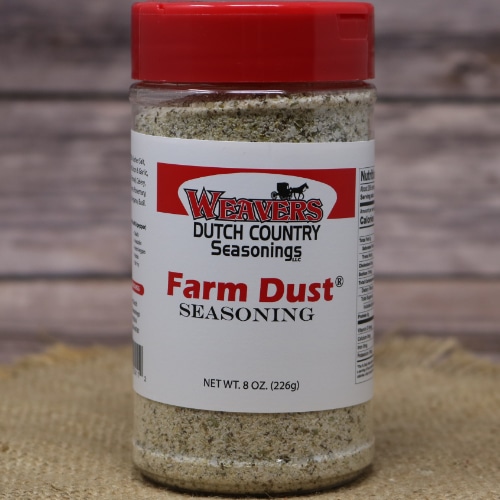 Close-up of Weaver's Farm Dust Seasoning jar with a vibrant red lid, showcasing the textured seasoning blend.