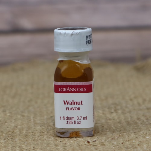 A small bottle of LorAnn Oils Walnut Flavor with a white cap.