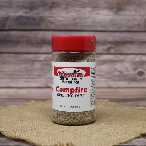 A jar of Weaver's Dutch Country Seasonings Campfire Grilling Dust with a red lid.