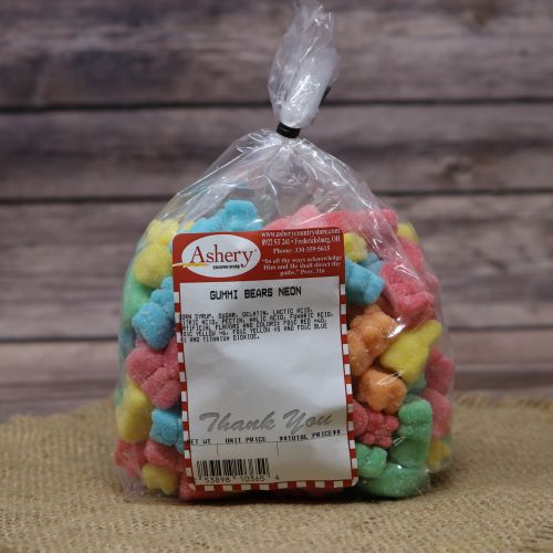 Clear plastic Ashery bag with red and white sticker label filled with colorful candies sitting on a burlap material with wood background