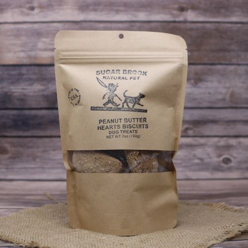 Bag of peanut butter heart dog biscuits made by Sugar Brook Natural Pet