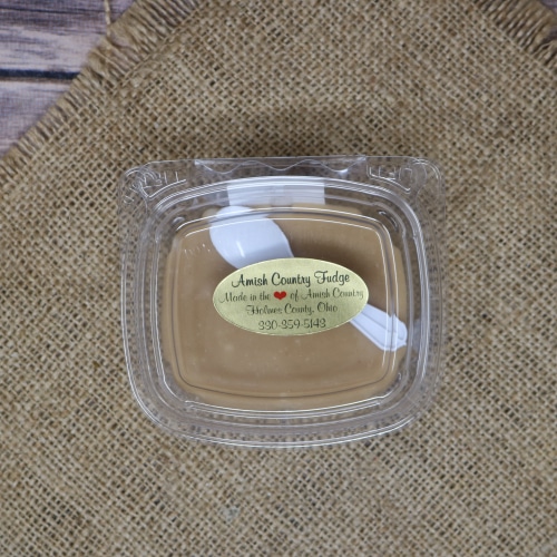 Container of Amish Country Fudge in peanut butter flavor, set against a hessian burlap backdrop, capturing the simplicity of Amish confectionery.